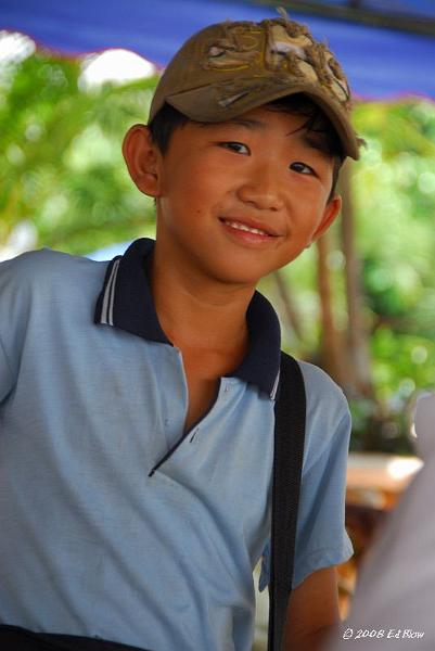 Boy selling lottery tickets.jpg